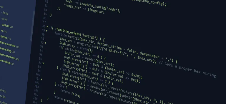 Colourful PHP code in a dark editor, with the project files on the left